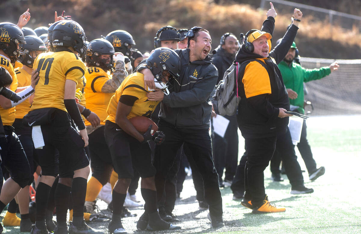 Lincoln Abes sideline celebrates John John Nelson’s interception during Saturday afternoon’s football game against the Lakes Lancers at Lincoln Bowl in Tacoma, Washington, on Oct. 22, 2022.