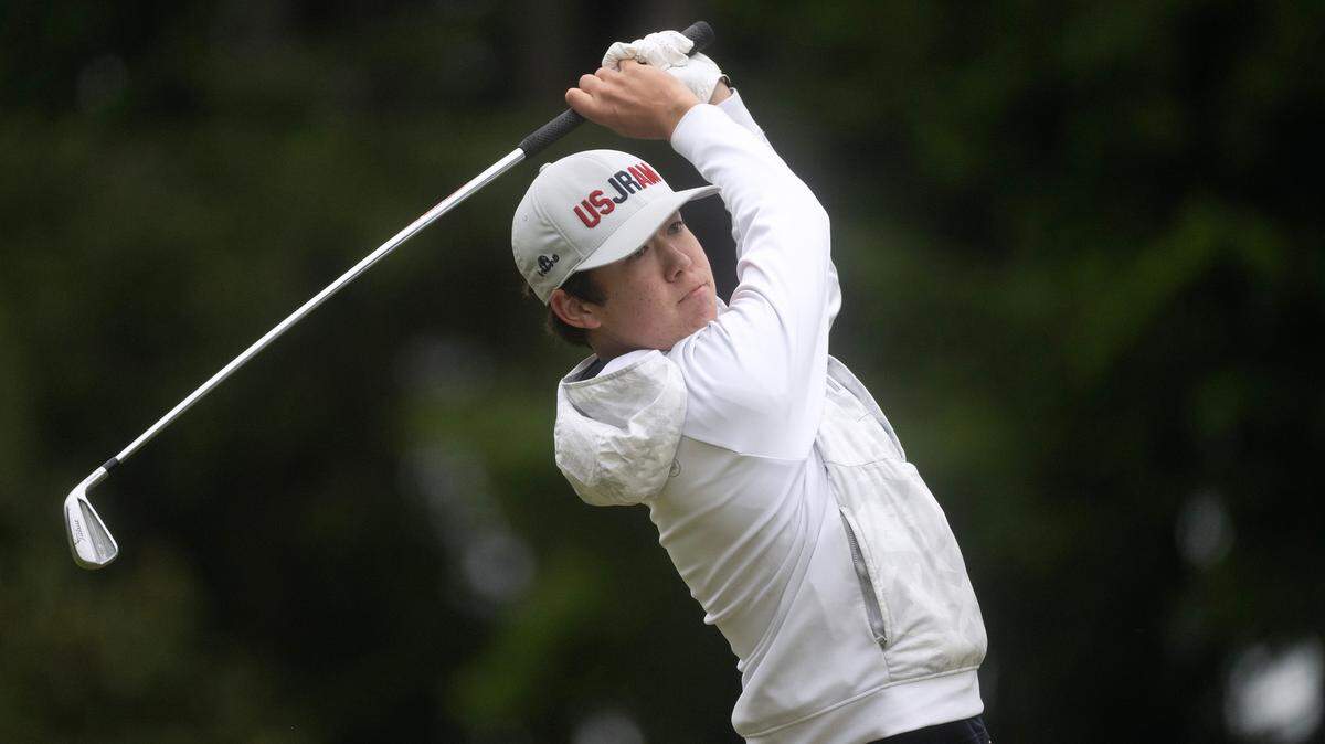 Gig Harbor’s Theo Snyder tees off on the par 3 16th hole during the opening day of the 3A Boys Golf State Championships at The Golf Club at Hawks Prairie in Lacey, Washington, on Tuesday, May 21, 2024.
