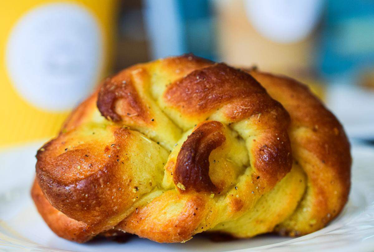 The orange-cardamom bun has become a customer favorite in the first few weeks. Owner/Baker Honey Batth zests and squeezes fresh oranges and hand-pounds cardamom pods to add to the soft and fluffy dough.