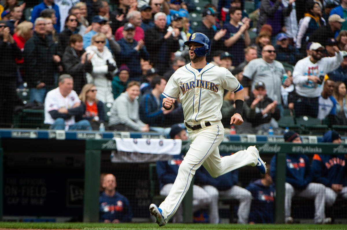 Mitch Haniger scores on a Domingo Santana double in the second inning. The Seattle Mariners played the Houston Astros in a Major League Baseball game at T-Mobile Park in Seattle, Wash., on Sunday, April 14, 2019.