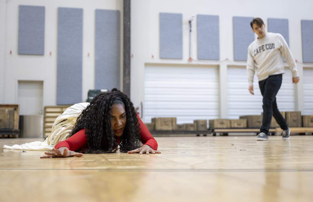J’Nai Bridges, left, as Carmen, and Ryan Capozzo, as Don José, act out a scene of Carmen during a rehearsal at Seattle Opera, on Tuesday, April 21, 2026, in Seattle, Wash. Bridges, who was born and raised in Lakewood, has sung the role of Carmen all over the world in more than a dozen productions, and it’s become her signature role.