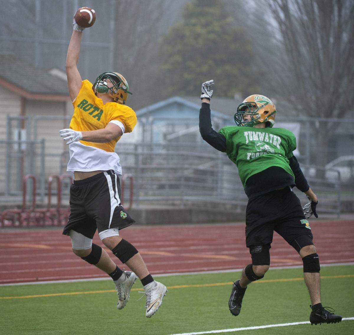 Tumwater sophomore tight end Ryan Otton makes a one-handed sideline catch during football practice at Tumwater District Stadium on Thursday, Nov. 21, 2019.