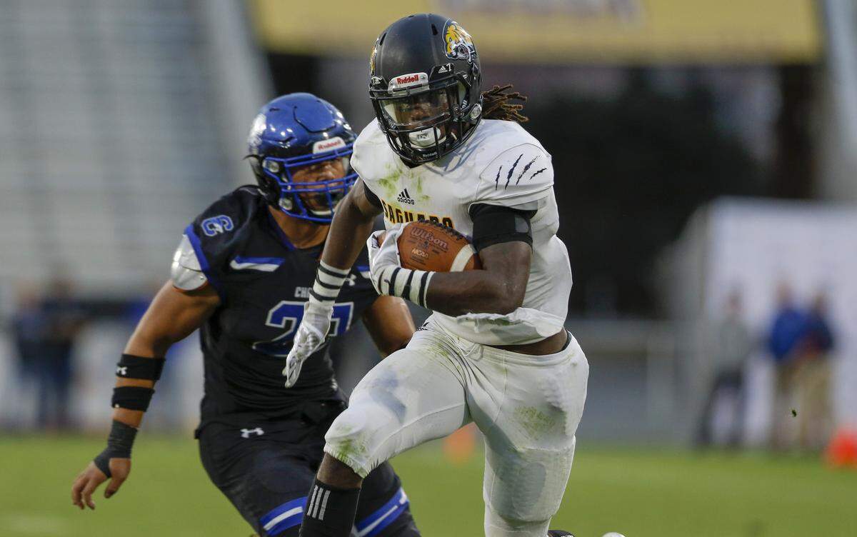 Saguaro High School’s Kelee Ringo runs the ball in the Open Division State Championship on Dec. 7, 2019 in Tempe, Ariz.