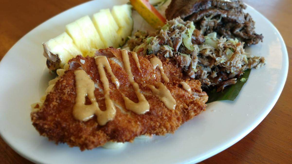 The luau platter comes with chicken katsu, kalua pork and glazed tri-tip steak at Cooks Tavern.