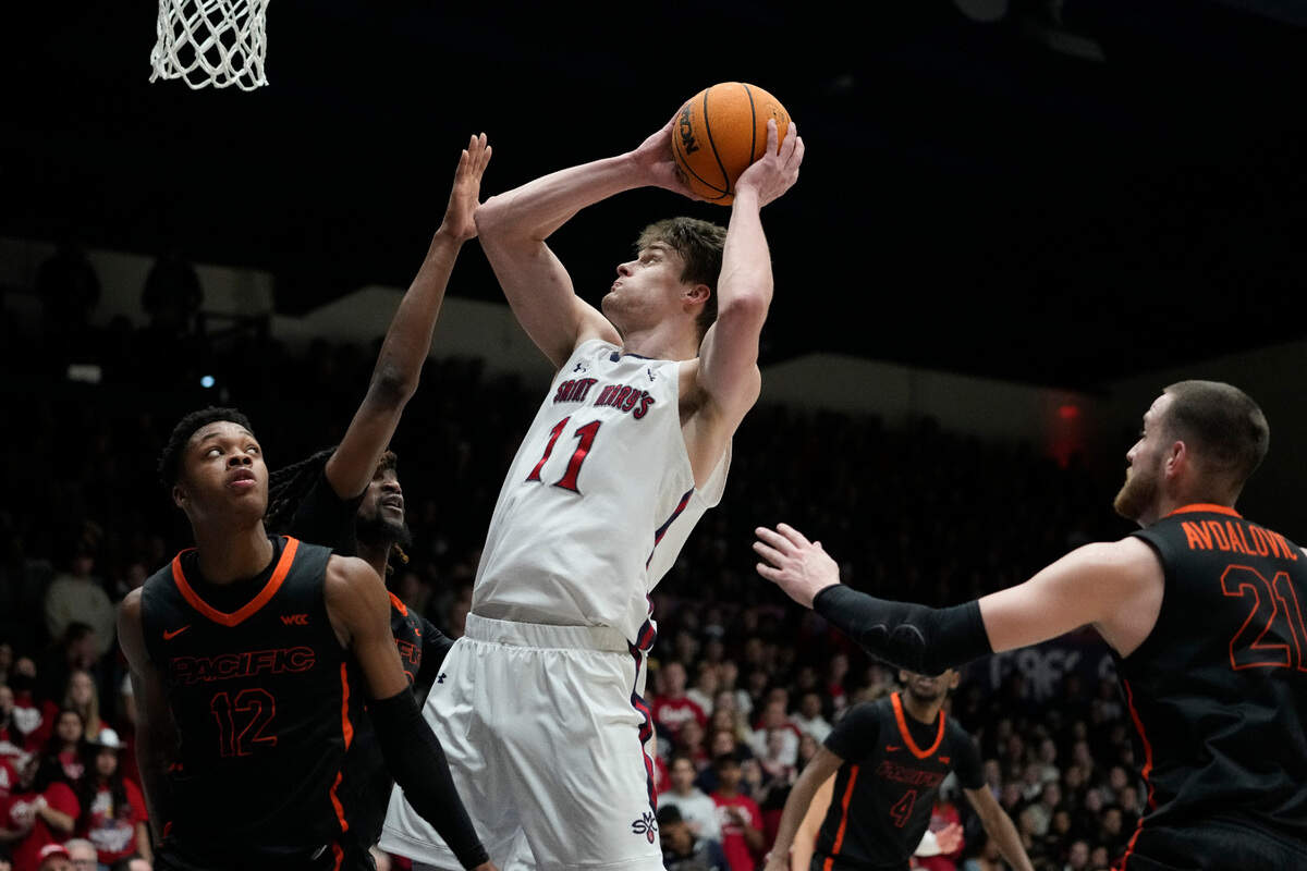 Saint Mary’s center Mitchell Saxen (11) shoots against Pacific during the first half of an NCAA college basketball game in Moraga, Calif., Thursday, Feb. 23, 2023. (AP Photo/Godofredo A. Vásquez)