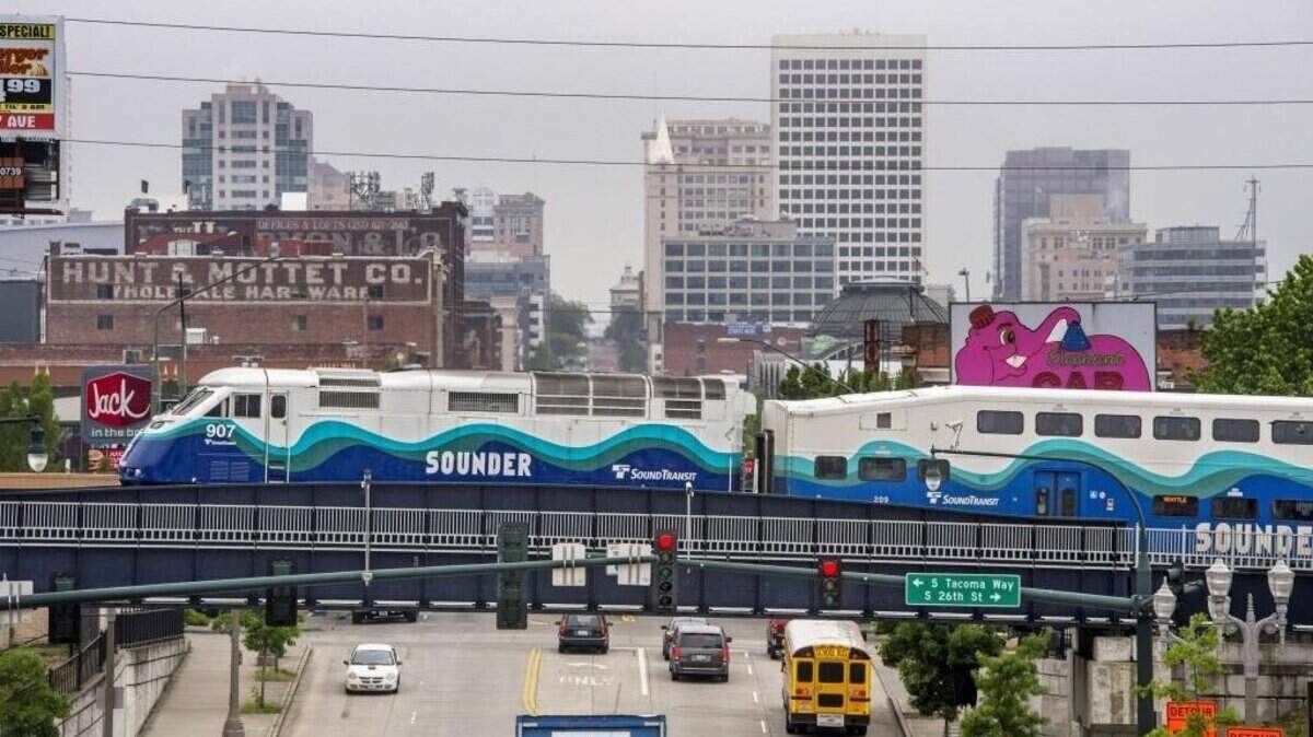 A Sound Transit Sounder train rolls over Pacific Avenue in Tacoma on June 19, 2017. Multiple trains have been canceled between Seattle and Pierce County on Thursday afternoon because of one locomotive’s mechanical issues, a Sound Transit spokesman said.