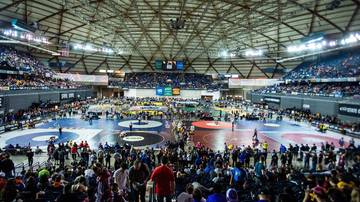 The crowd watches as wrestlers compete in Mat Classic XXXI at the Tacoma Dome in Tacoma, Wash., on Friday, Feb. 15, 2019. Vendors at the Dome might be in for a tax break.