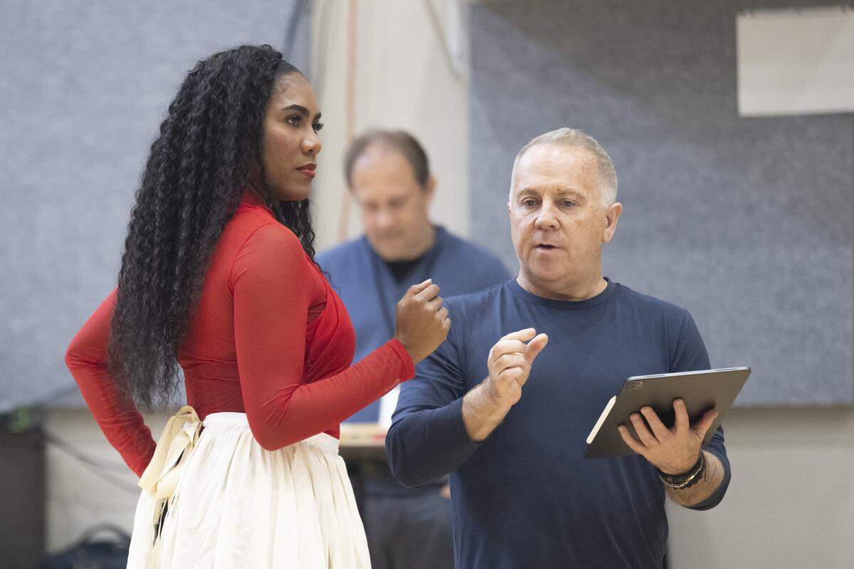 J’Nai Bridges, as Carmen, takes notes from stage director Paul Curran during a rehearsal for Carmen at Seattle Opera, on Tuesday, April 21, 2026, in Seattle, Wash. Bridges, who was born and raised in Lakewood, has sung the role of Carmen all over the world in more than a dozen productions, and it’s become her signature role.