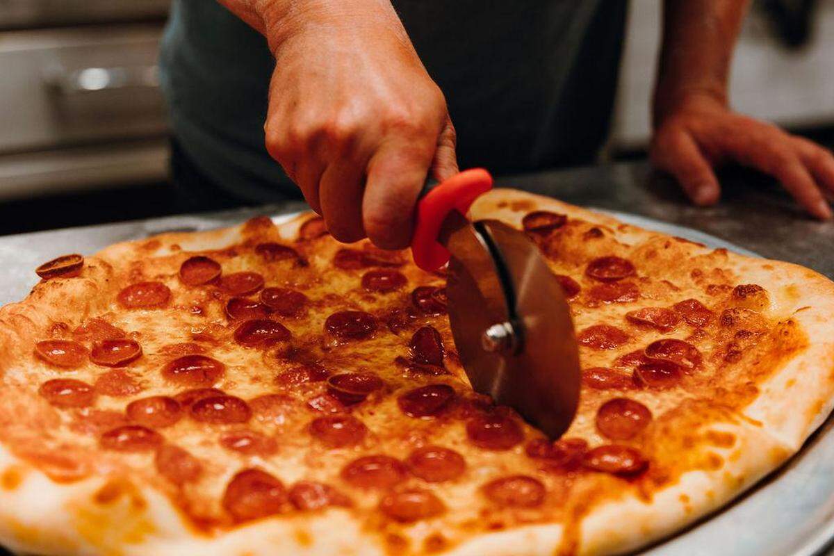 Camp Colvos Brewing in downtown Tacoma serves draft beer, classic cocktails and New York-style pizzas whole and by the slice. 
