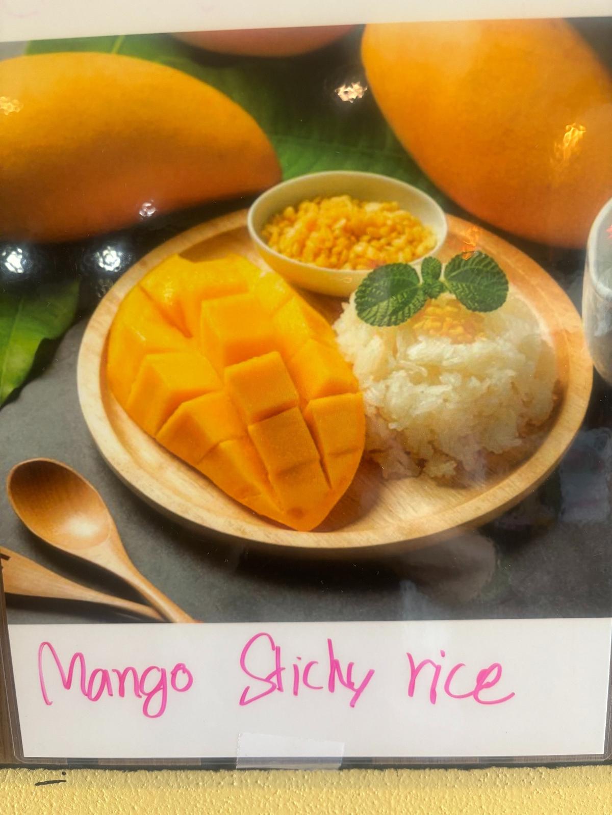 Wok on Fire Asian BBQ at Olympic Village, which reopened as a Thai restaurant June 27, 2025, serves desserts including seasonal mango sticky rice.