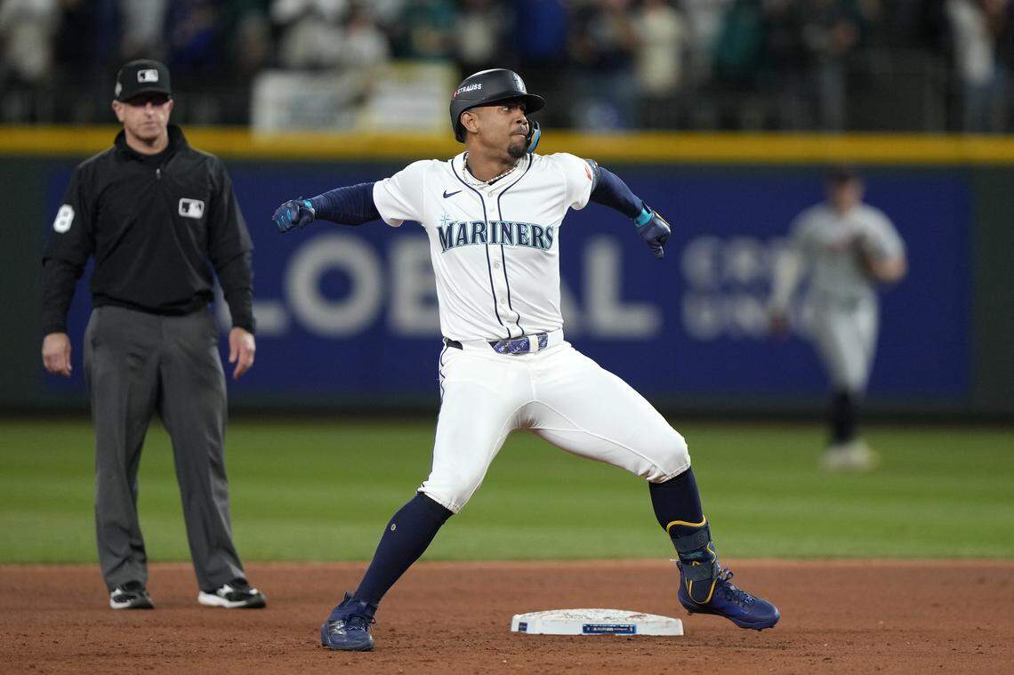 Oct 5, 2025; Seattle, Washington, USA; Seattle Mariners center fielder Julio Rodriguez (44) celebrates after hitting an RBI double against the Detroit Tigers in the eighth inning during game two of the ALDS round for the 2025 MLB playoffs at T-Mobile Park. Mandatory Credit: Stephen Brashear-Imagn Images