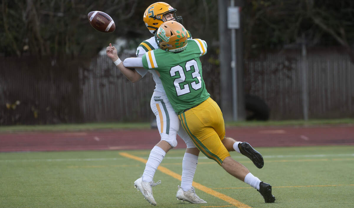 Tumwater defensive back Cash Short sacks Sehome quarterback in the end zone for a safety during Satuday afternoon’s state playoff game at Tumwater District Stadium in Tumwater, Washington, on Friday, Nov. 23, 2024. Tumwater won the game, 70-7, to advance to the state semifinals.