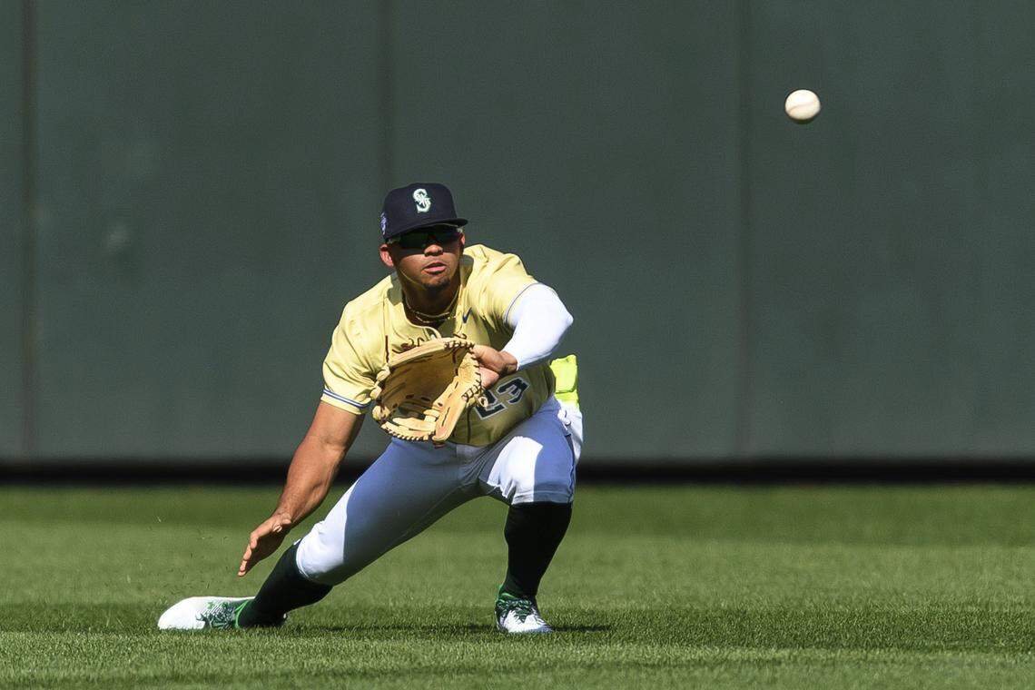 Seattle Mariners’ Jonatan Clase fields a bouncing ball during the second inning of the All-Star Futures baseball game Saturday, July 8, 2023, in Seattle. (AP Photo/Caean Couto)