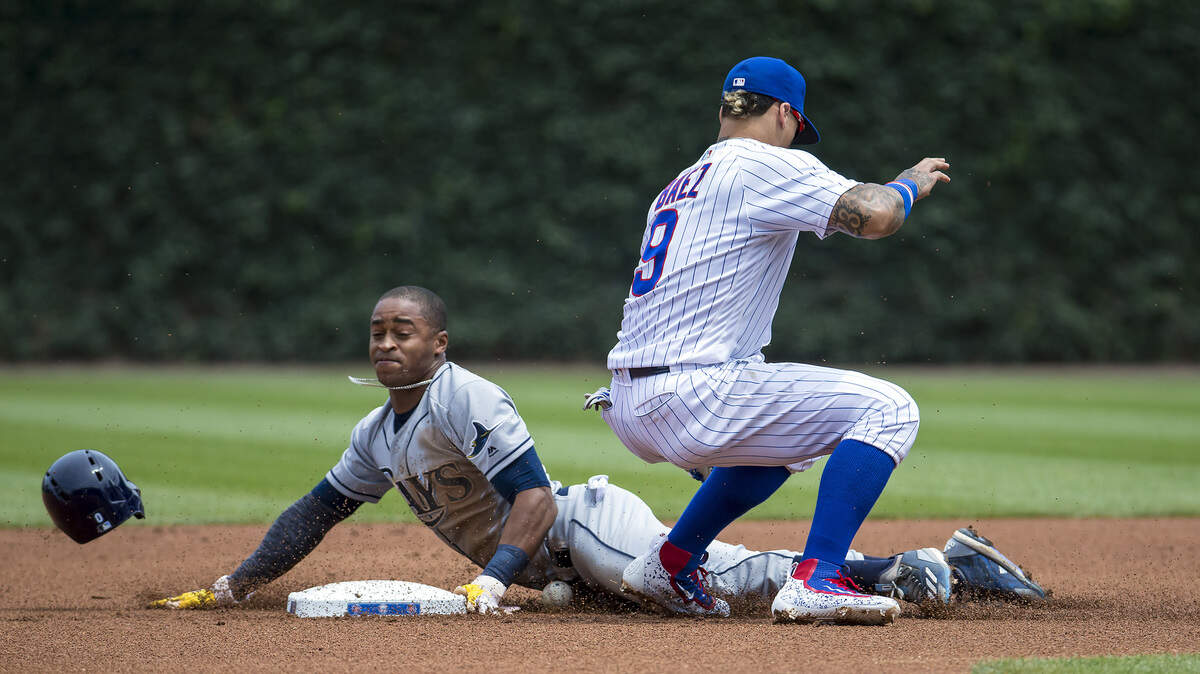 Tampa Bay Rays center fielder Mallex Smith (0) steals second base ahead of Chicago Cubs second baseman Javier Baez (9) in the first inning on Wednesday, July 5, 2017 at Wrigley Field in Chicago, Ill. (Brian Cassella/Chicago Tribune/TNS)