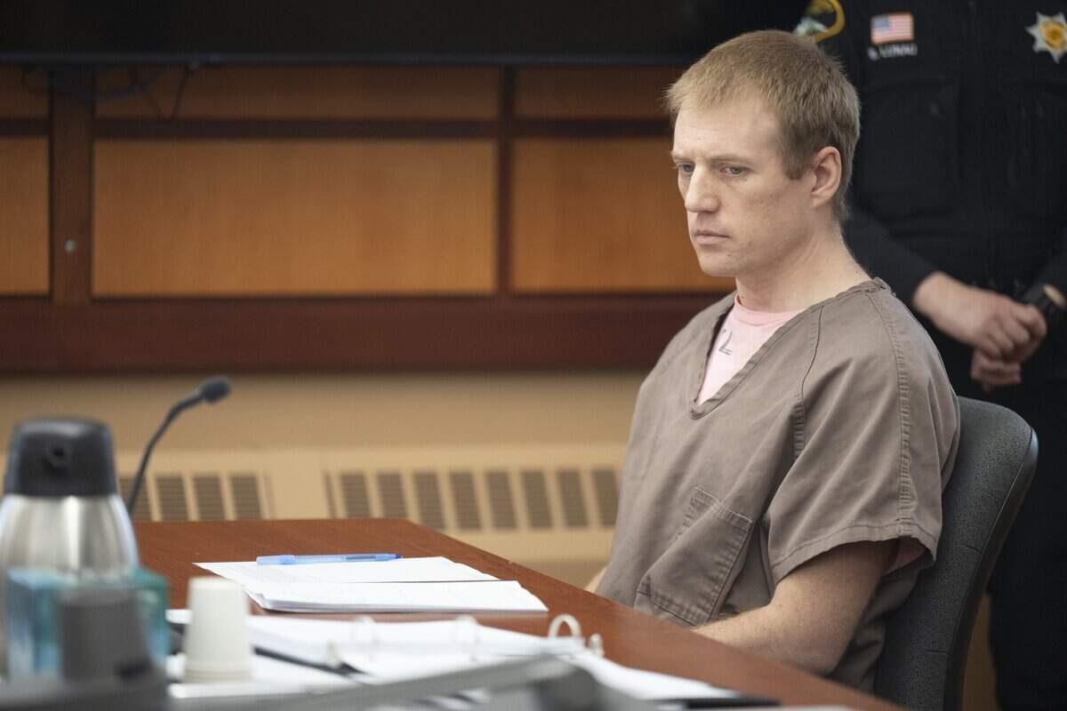 Jordan Henderson, 36, sits after hearing his sentence on Friday, May 8, 2026, at Pierce County Superior Court in Tacoma, Wash. Henderson was sentenced to 66 years to life in prison for 12 counts of first-degree child molestation.