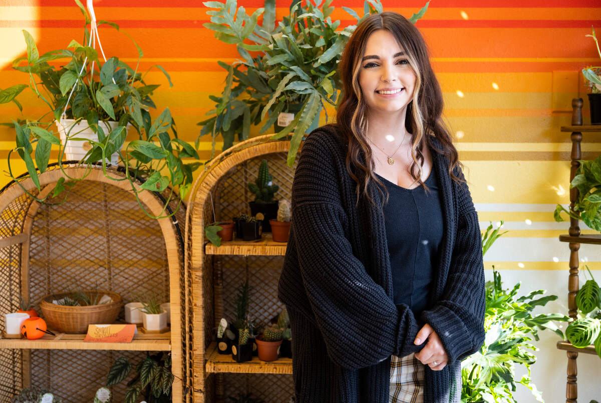 Sunne Plant Shop owner Desiray O’Brien poses for a portrait in her shop in downtown Sumner, Wash. on Oct. 13, 2022. O’Brien opened her business approximately a month ago and sells various plants along with home decor and other items created by local artists and small businesses.