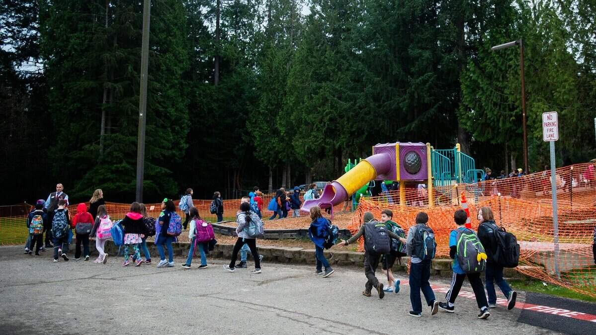 How bad is overcrowding in Peninsula School District? Students leave Discovery Elementary School to board buses at Gig Harbor High School next door. Bus space at Discovery has been taken up by portable classroom units. Peninsula is one three local districts with school construction bonds on the Feb. 12 ballot. The others are Bethel and Yelm.