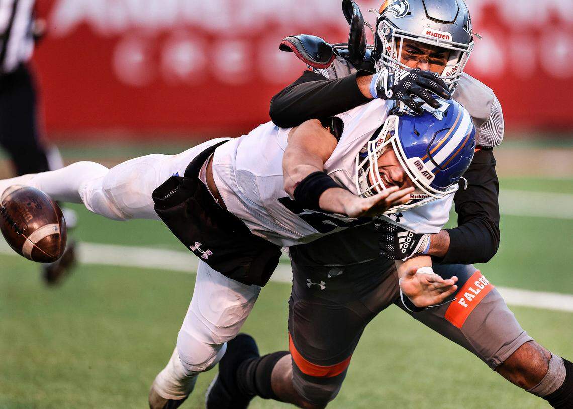 Bingham quarterback Dallen Martinez is sacked by Skyridge’s Tausili Akana during the 6A state semifinal game at Rice-Eccles Stadium in Salt Lake City on Thursday, Nov. 10, 2022. Skyridge&nbsp;won 45-20.
