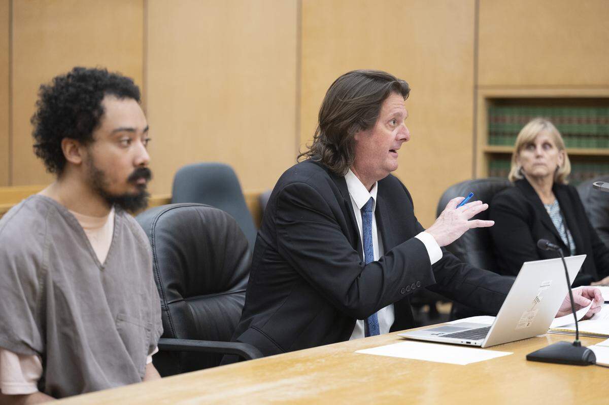 Defense attorney Peter Reich, center, speaks during the sentencing of Nicholas Fitzgerald Matthew, left, on Friday, May 29, 2026, at Pierce County Superior Court in Tacoma. Matthew was convicted of trying to murder a woman walking alone on a trail at Tacoma’s Point Defiance Park and was sentenced Friday to 22 years in prison.