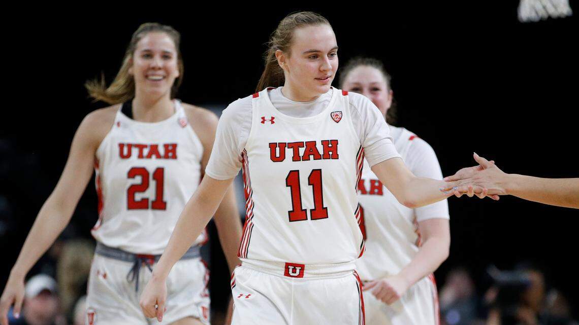 Utah’s Brynna Maxwell (11) celebrates after a play gainst Washington during the second half of an NCAA college basketball game in the first round of the Pac-12 women’s tournament Thursday, March 5, 2020, in Las Vegas. (AP Photo/John Locher)