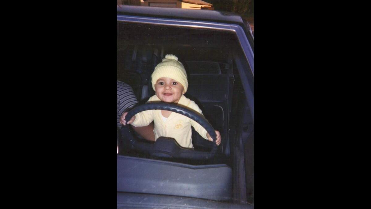 Samuel Garza Gonzalez is shown in a childhood photograph behind the wheel of a 1975 Chevrolet Monte Carlo. Garza Gonzalez was killed in a drive-by shooting in Tacoma at age 24. His death and his love for cars inspired the creation of a women’s car club, Unidas Por Vida.