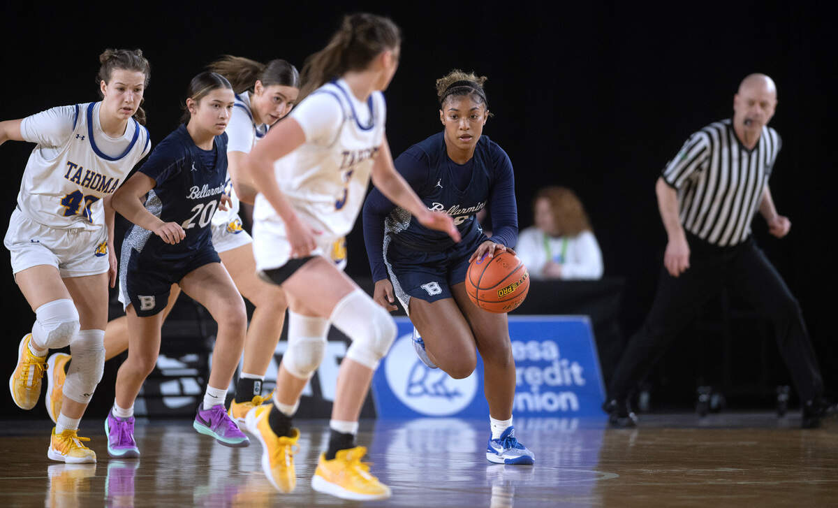 Bellarmine’s Kayla Frazier pushes the ball up court against the Tahoma defense during Wednesday morning’s opening-round game of the 4A girls state basketball tournament in the TacomaDome in Tacoma, Washington, on Wednesday, Feb. 28, 2024. Tahoma won the game, 53-38.