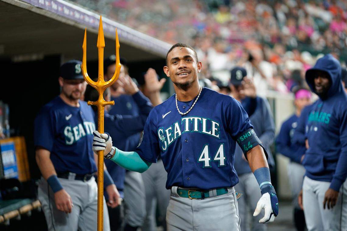 Seattle Mariners’ Julio Rodriguez celebrates his two-run home run against the Detroit Tigers in the ninth inning of a baseball game, Friday, May 12, 2023, in Detroit. (AP Photo/Paul Sancya)
