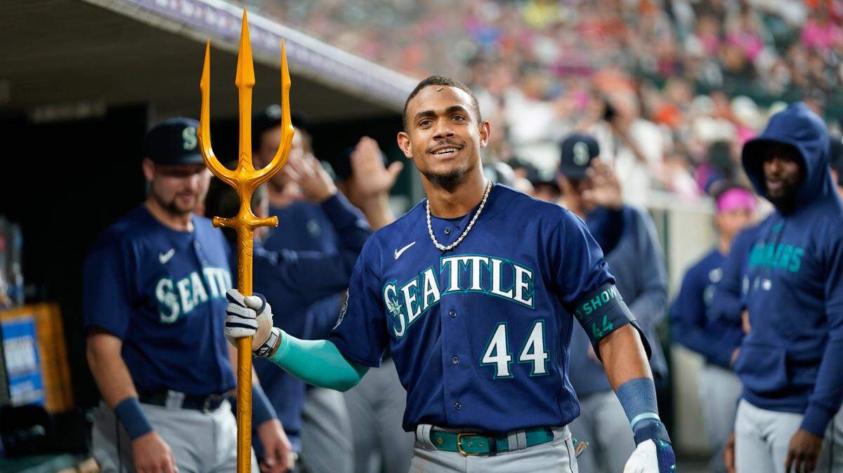 Seattle Mariners’ Julio Rodriguez celebrates his two-run home run against the Detroit Tigers in the ninth inning of a baseball game, Friday, May 12, 2023, in Detroit. (AP Photo/Paul Sancya)