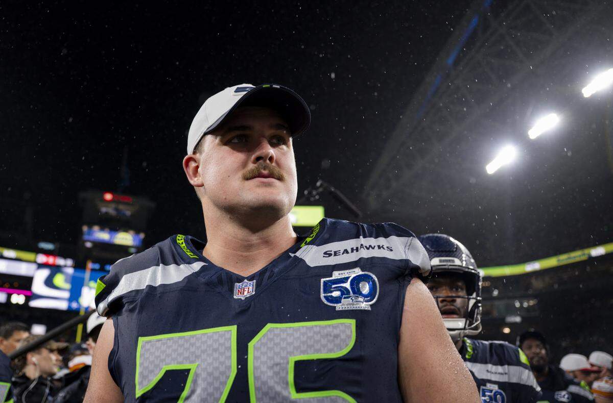 Seattle Seahawks guard Grey Zabel (76) walks on to the field after the Seattle Seahawks 33-16 victory in the preseason game at Lumen Field, on Friday, Aug. 15, 2025, in Seattle.