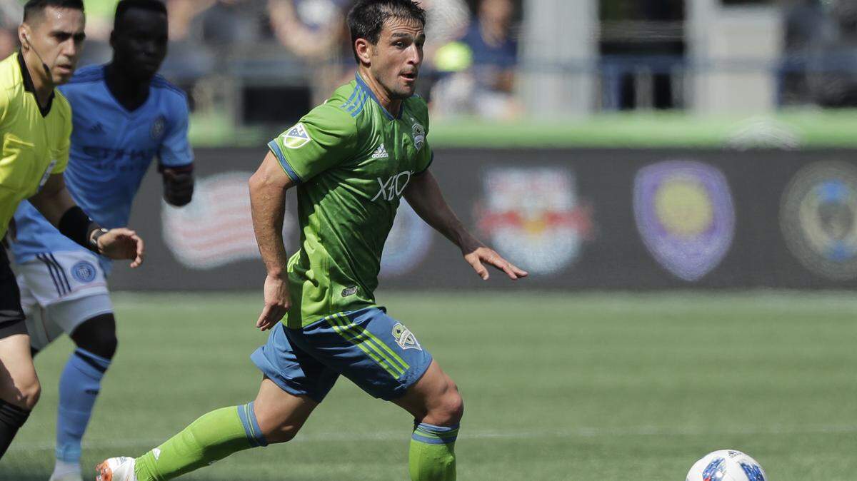 Seattle Sounders midfielder Nicolas Lodeiro looks to pass against New York City during the first half of an MLS soccer match, Sunday, July 29, 2018, in Seattle. The Sounders won 3-1. (AP Photo/Ted S. Warren)