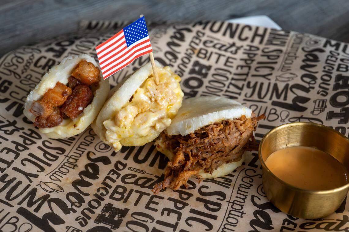 These homemade arepitas feature pork belly, chicken, and birria, toothpicked with a mini American flag.