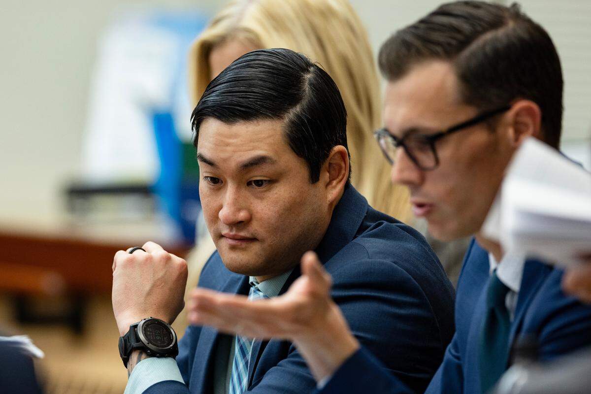 Defendant Timothy Rankine listens to defense attorney Mark Conrad speak Wednesday, Oct. 25, 2023, at Pierce County Superior Court in Tacoma. (Luke Johnson / Pool / The Seattle Times)
