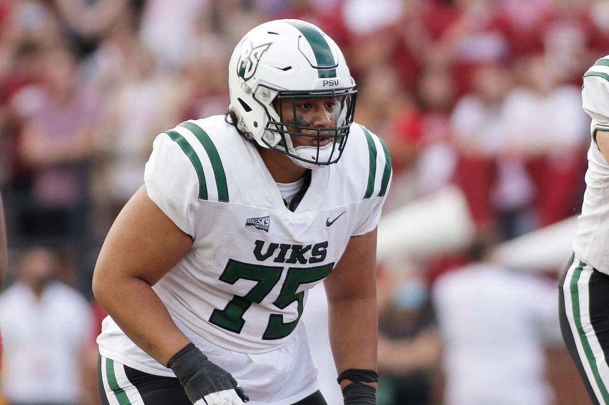 Portland State offensive lineman D’Angalo Titialii lines up for a play during the second half of an NCAA college football game against Washington State, Saturday, Sept. 11, 2021, in Pullman, Wash. (AP Photo/Young Kwak)