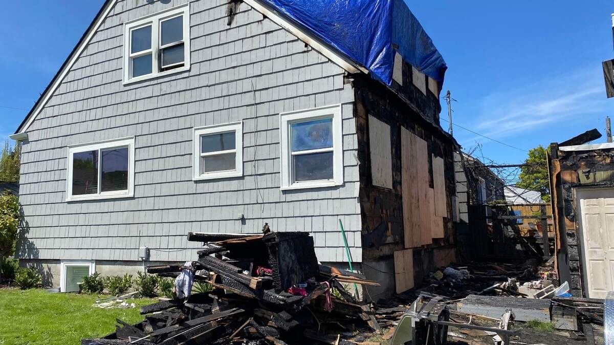 A 15-year-old girl sustained critical injuries when she jumped from this burning home on North Alder Street in Tacoma Friday morning.