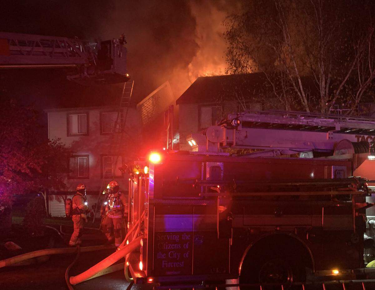 A fire broke out Thursday night at an apartment complex in South Tacoma, and fire department crews put out the flames. Officials said 22 people were displaced.