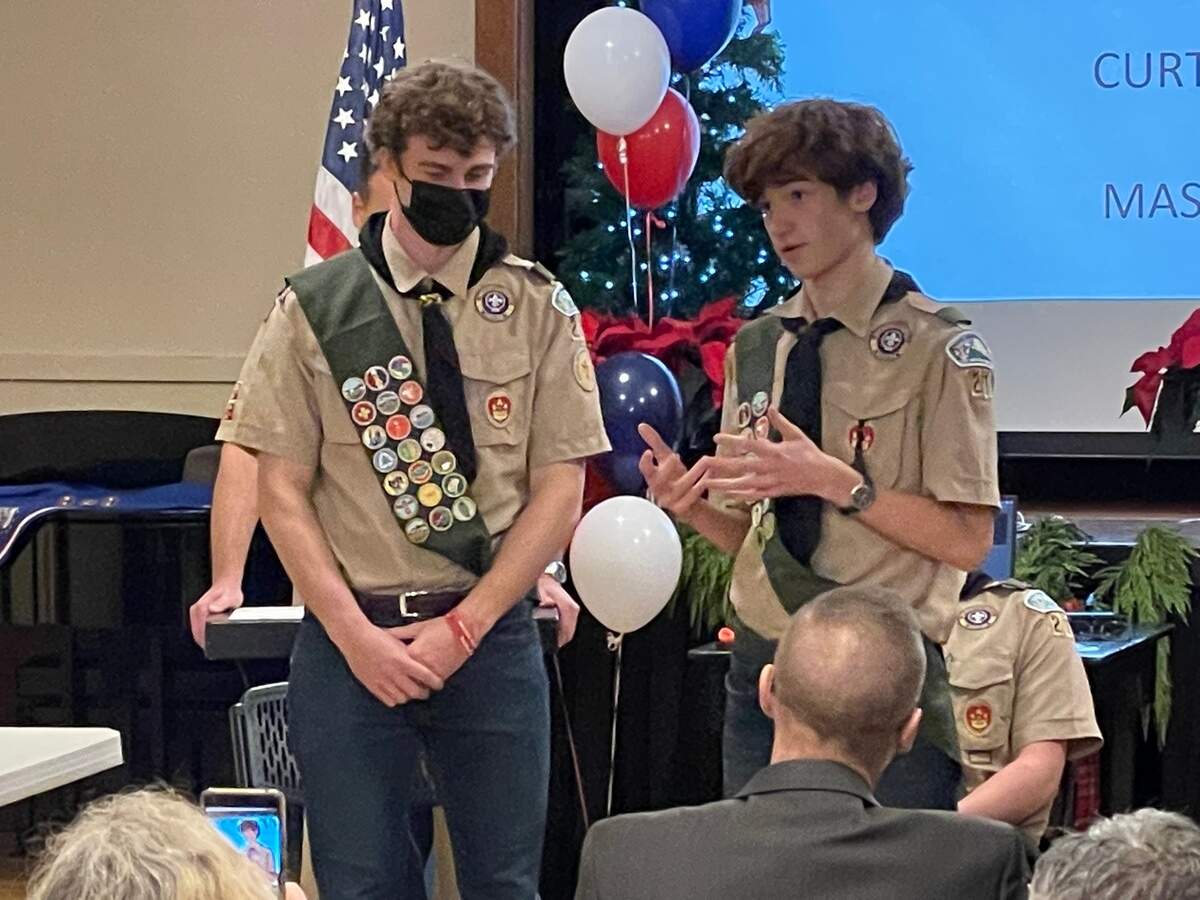 Max being honored by his younger brother Sam Walker.