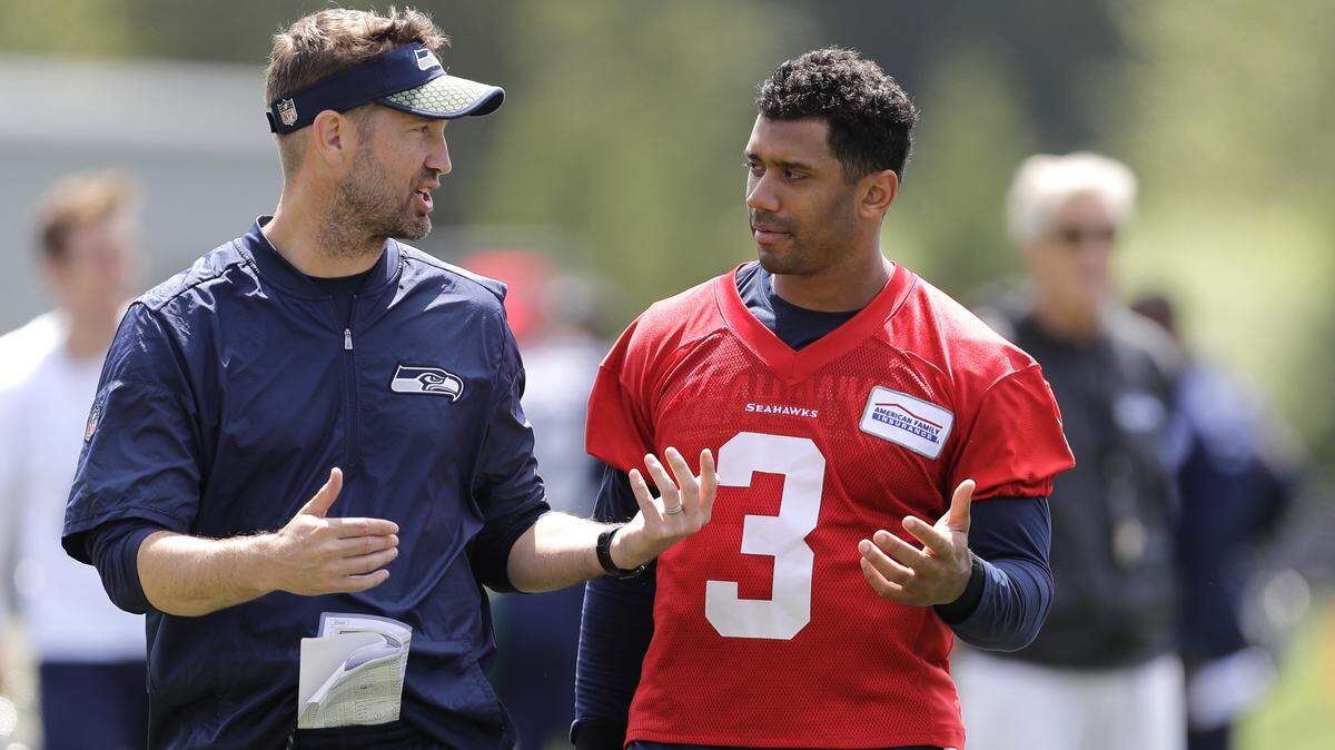 Of all the bonding these changed Seahawks must do during training camp beginning Thursday, the one between franchise quarterback Russell Wilson, right, and new offensive coordinator and play caller Brian Schottenheimer, left, will have the biggest impact on the 2018 season.