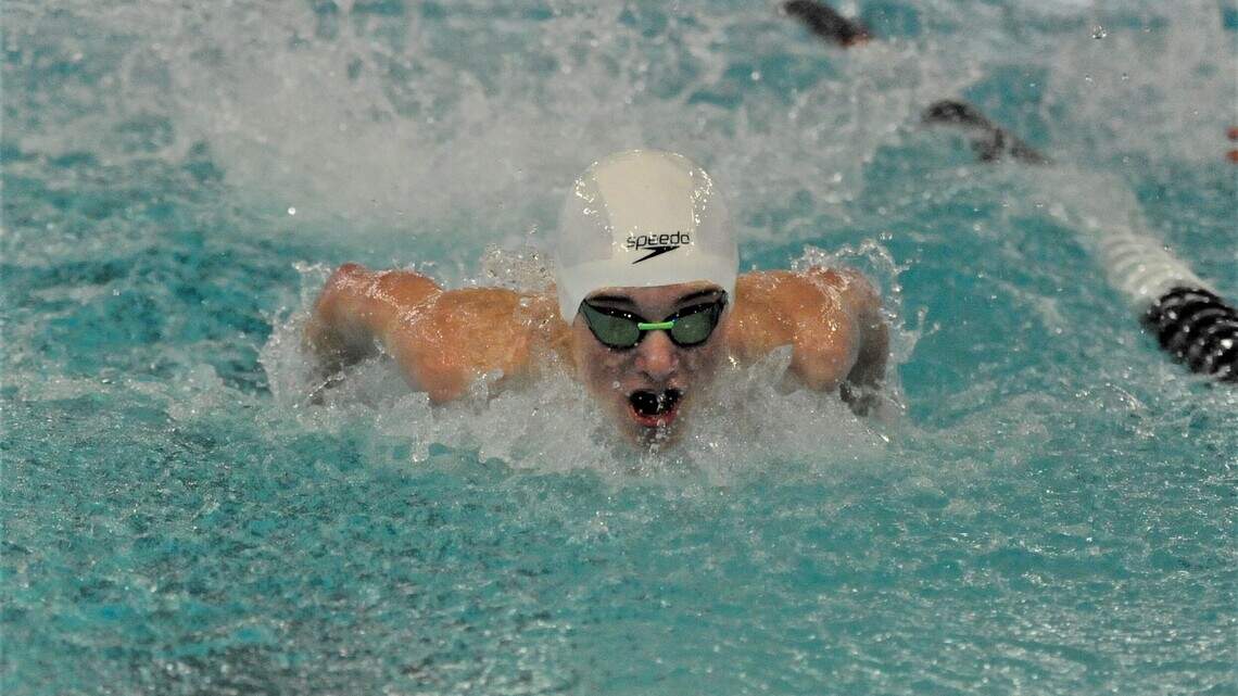 Gig Harbor swim wins district title, eyes top-10 finish at state meet