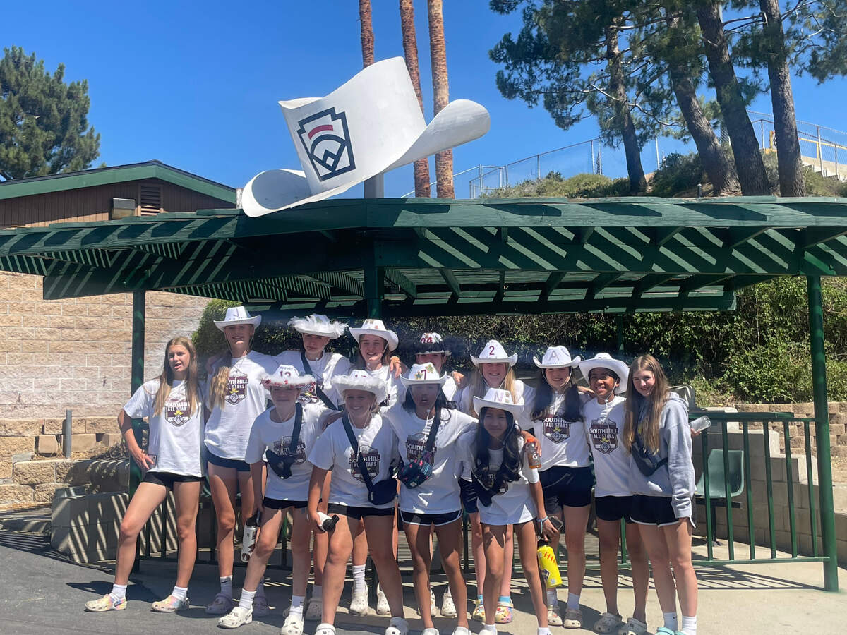 The South Hill majors all-star softball team poses for a photo outside the Little League Softball World Series Northwest region tournament complex in San Bernardino, California on July 20, 2023.