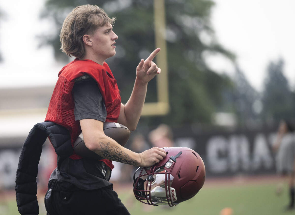 Bethel quarterback Evan Barnes walks off the field during a football practice at Bethel High School on Wednesday, Aug. 27, 2025, in Spanaway, Wash.