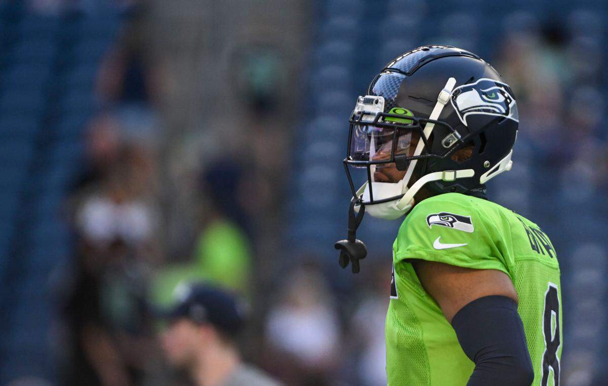 Seattle Seahawks cornerback Coby Bryant (8) runs drills during warm-ups before the mock game at Lumen Field, Friday, Aug. 4, 2023, in Seattle, Wash.