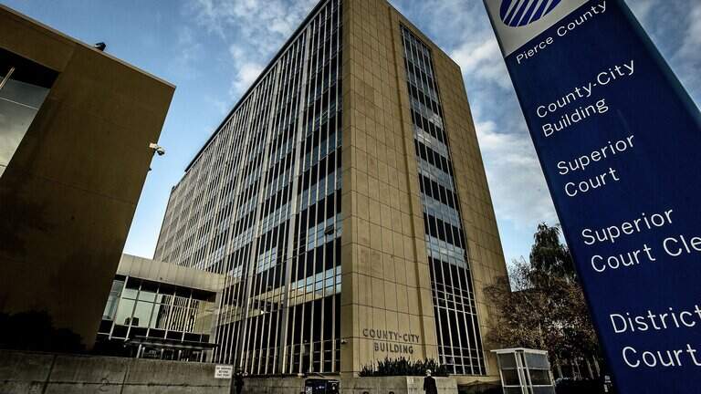 Pierce County advisory board member quits after old name links to criminal past
