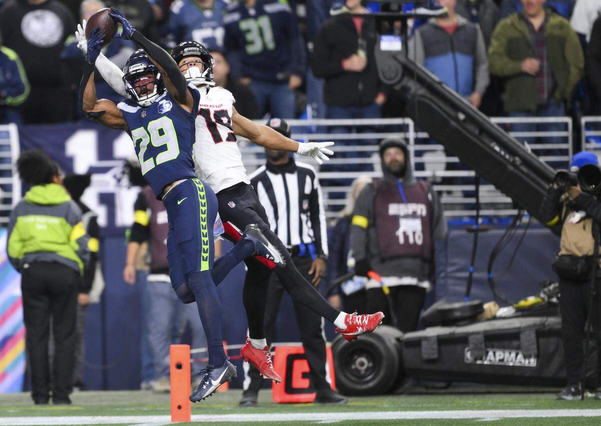 Seattle Seahawks cornerback Josh Jobe (29) breaks up a pass intended for Houston Texans wide receiver Xavier Hutchinson (19) during the fourth quarter of the game at Lumen Field, on Monday, Oct. 20, 2025, in Seattle.