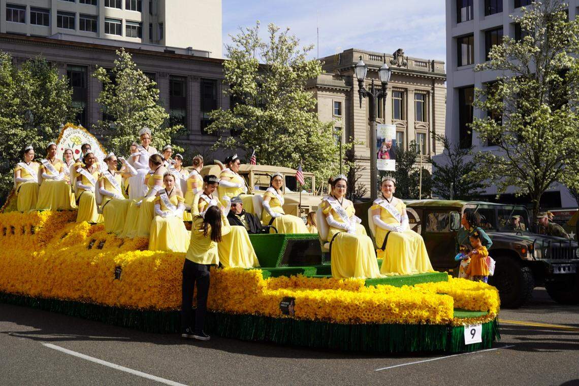 The Daffodil Royal Court, composed of 24 senior girls from participating Pierce County high schools, waits for the 92nd annual Daffodil Festival Parade to begin in Tacoma, Wash. on Saturday, April 5, 2025. This year’s queen, Harmony, is from Silas High School.