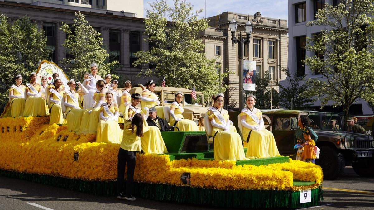 The Daffodil Royal Court, composed of 24 senior girls from participating Pierce County high schools, waits for the 92nd annual Daffodil Festival Parade to begin in Tacoma on April 5, 2025.