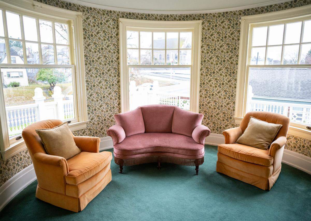 A view of a restored sitting room on the second floor in the original Rust Mansion.