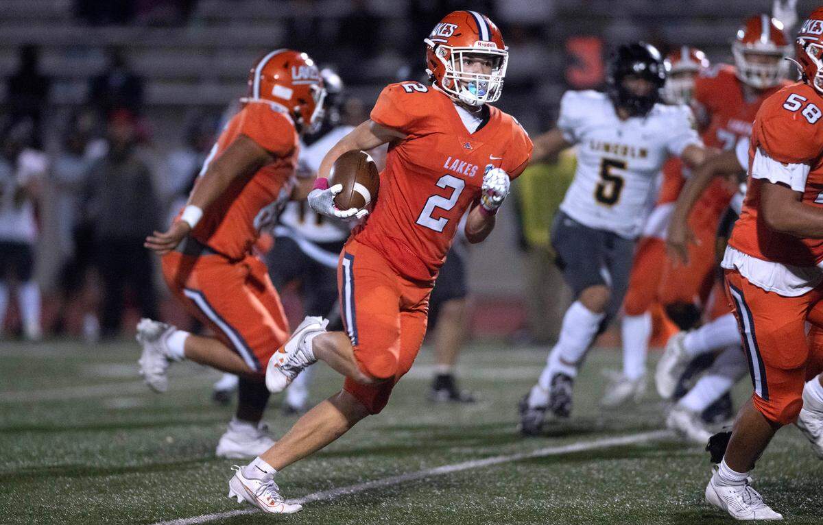 Lakes wide reciever E’Lijiah McChristian breaks loose for a touchdown reception during Friday night’s 3A PCL football game against the Lincoln Abes at Harry E. Lang Stadium in Lakewood, Washington, Oct. 20, 2023. Lincoln won the game, 28-20 in overtime.