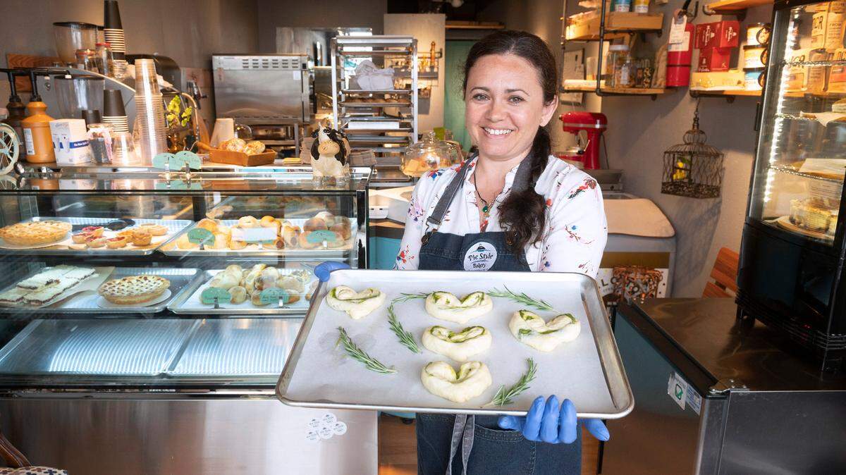 Oksana Lisnikova displays her popular Macha Hearts pastries (still uncooked) made with piroshki dough and green tea powder at her Pie Style Bakery in Auburn on Thursday, July 8, 2021.
