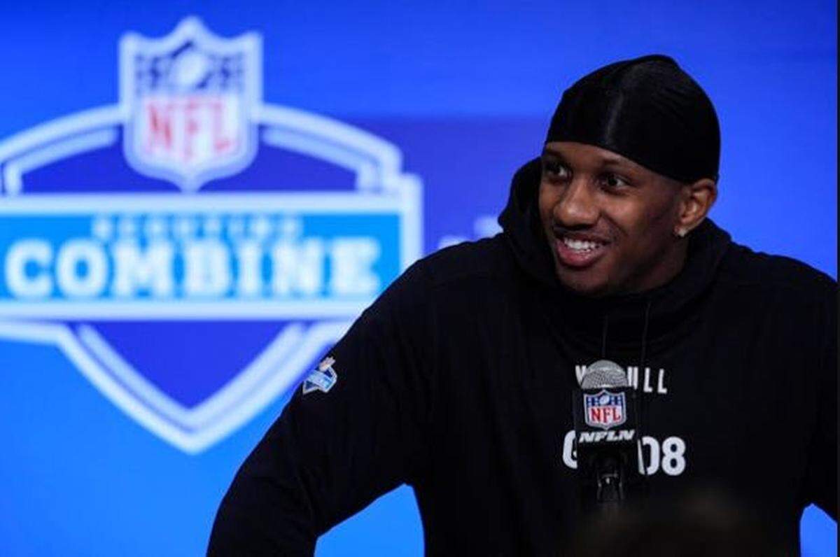 Former Washington Huskies quarterback Michael Penix Jr. speaking to reporters inside the Indiana Convention Center March 1, 2024, at the NFL scouting combine in Indianapolis.