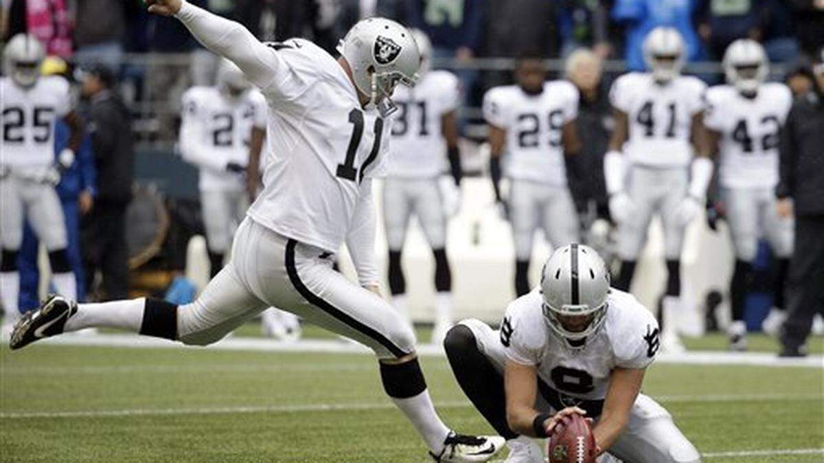 Sebastian Janikowski, here kicking for Oakland against the Seahawks at CenturyLink Field during a game in 2014, is reportedly visiting Tuesday with Seattle about a possible free-agent contract. He is 40 years old, the sixth-oldest player in the NFL.